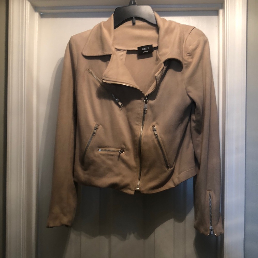 Tan cropped jacket with silver zippers